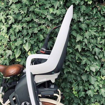 Kinderfahrradsitz Caress mit Adapter für Gepäckträgermontage
