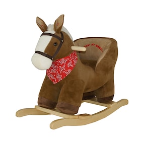Le cheval à bascule avec son