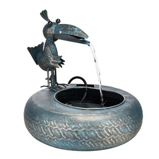 Fontaine en métal avec oiseau