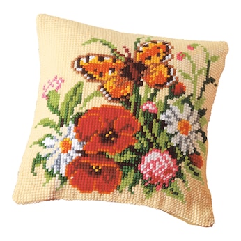 Coussin en point de croix « Fleurs et papillon »