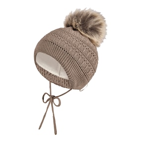 Bonnet d’hiver en maille avec pompon en fausse fourrure