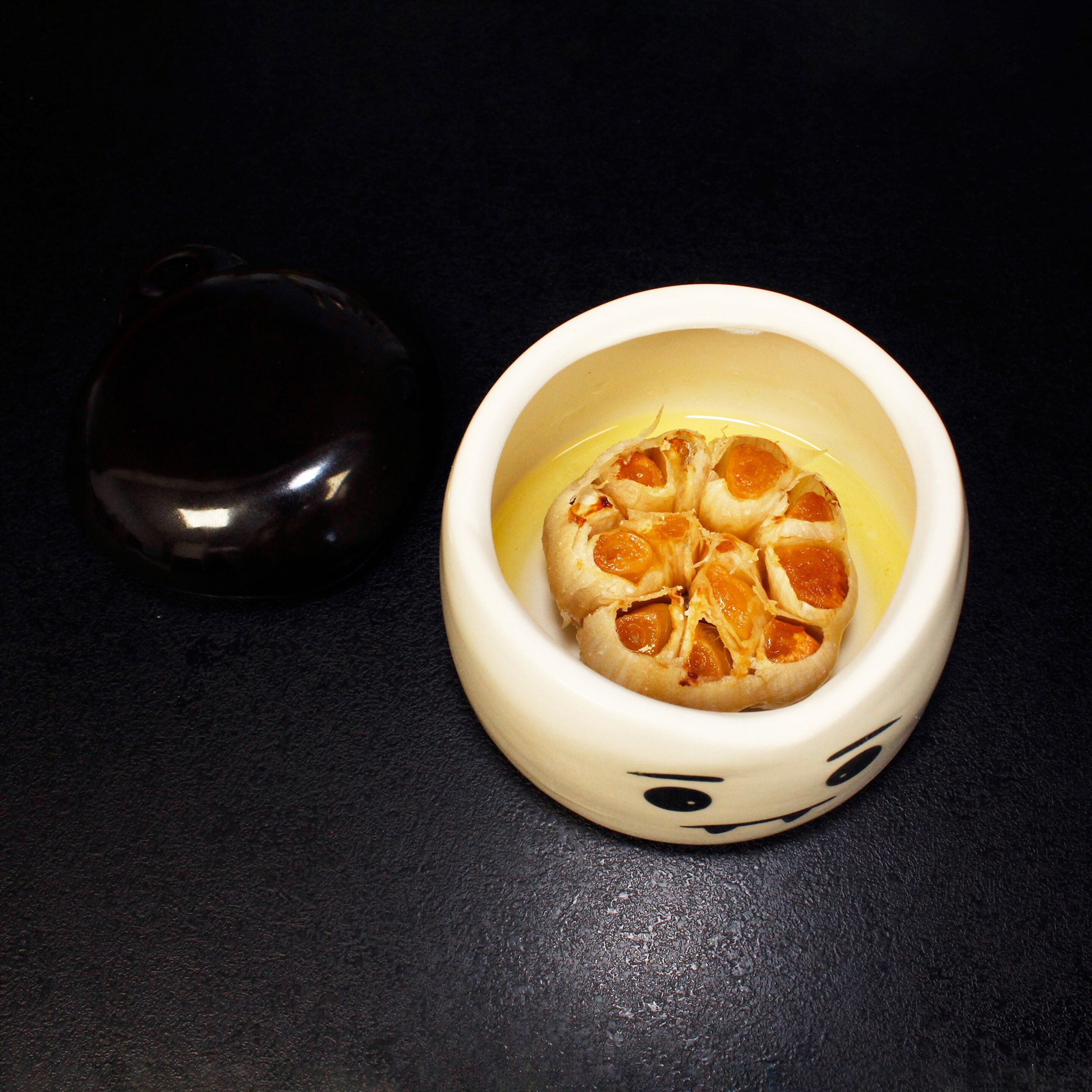 Knoblauch-Röster und Aufbewahrungsbehälter "Vampir"